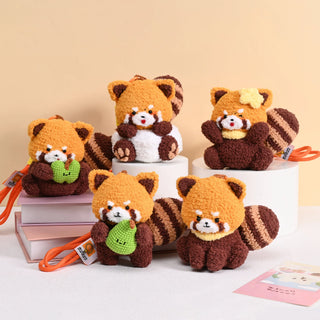 Handmade crochet red panda plush toys with striped tails and cute facial expressions